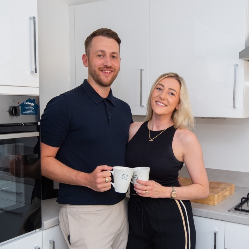 Bellway couple in their kitchen